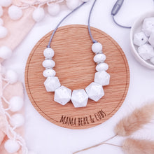 Load image into Gallery viewer, Necklace with white beads on a wooden board labeled &#39;Mama Bear &amp; Cubs&#39; with decorative elements.
